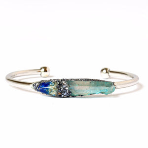 natural lapis lazuli and aqua aura quartz bracelet on white background